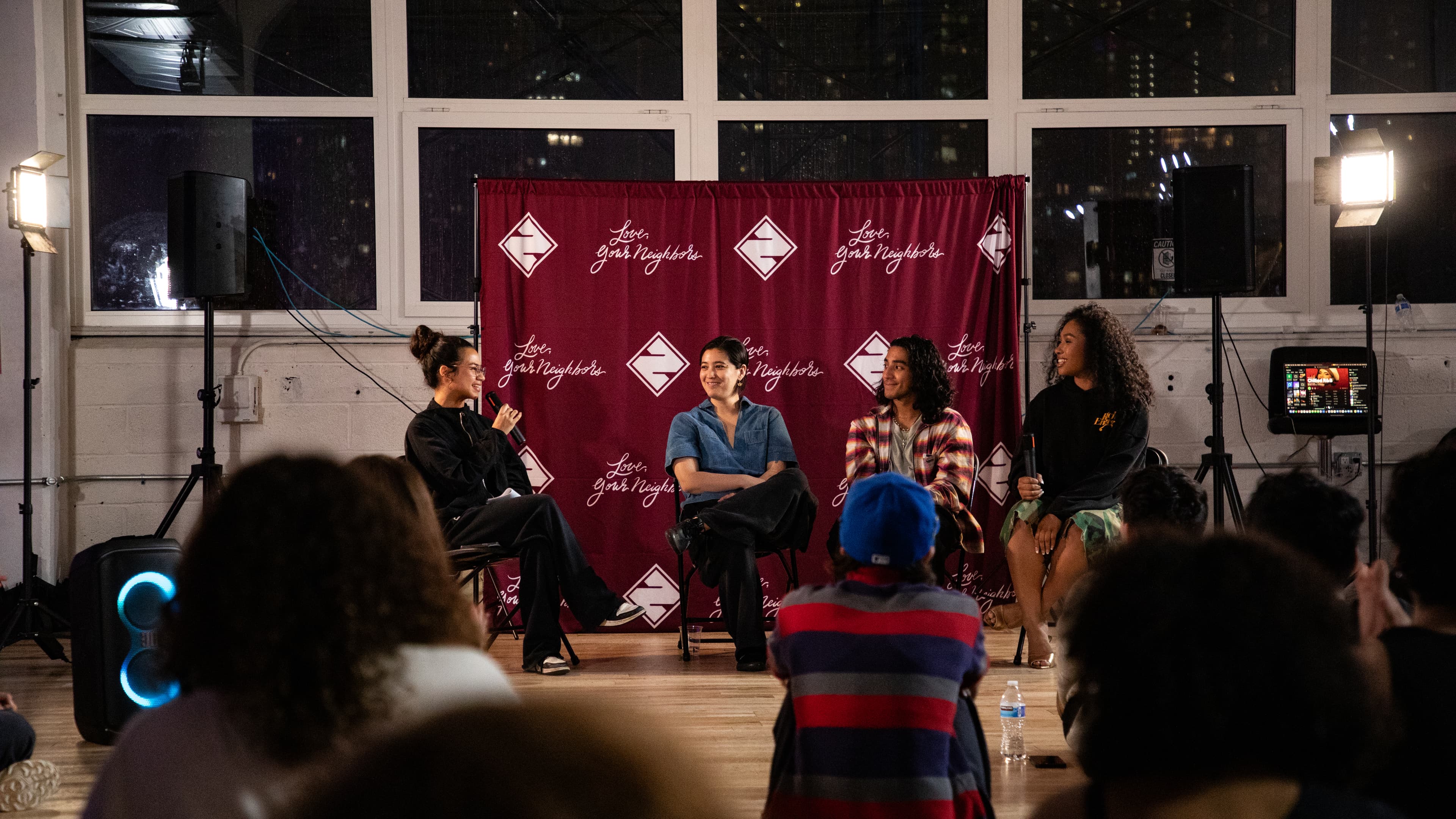 Sophie Anderson moderating an industry panel with Celine Boom, Sarah Esser, and Aaron Quini.
